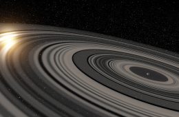 Planeta J1407b z ogromnym systemem pierścieni. Rys. Ron Miller